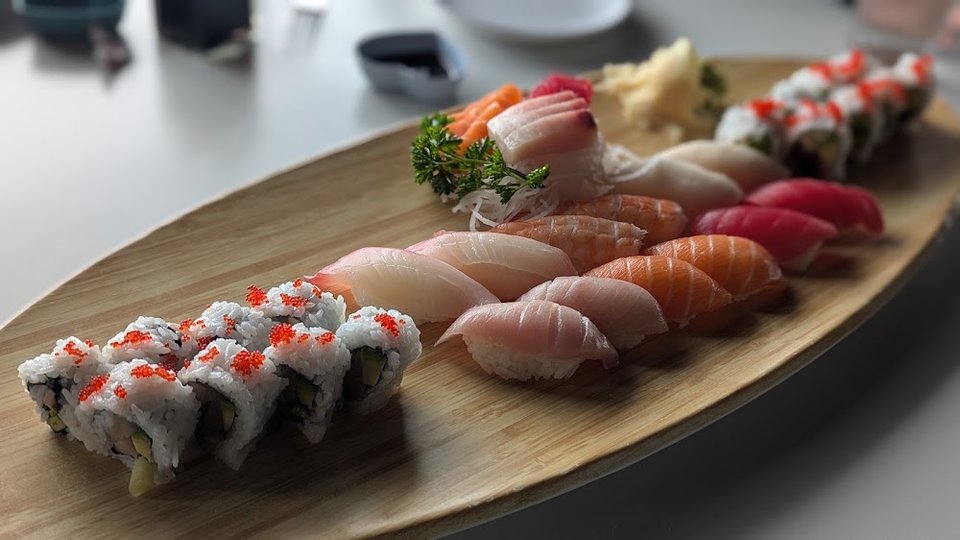 Menu layout listing sushi and chicken dishes.